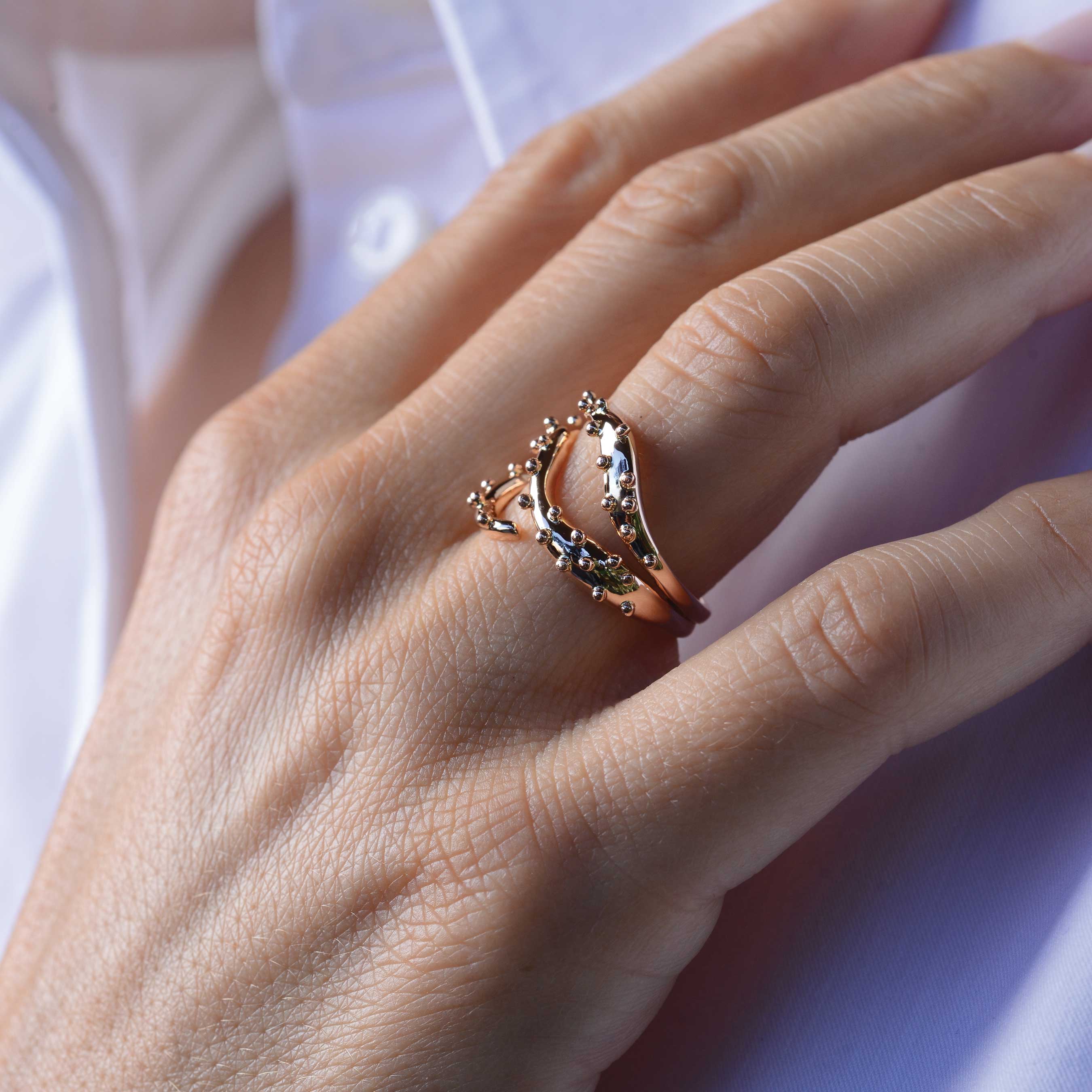 gold ring on woman hand