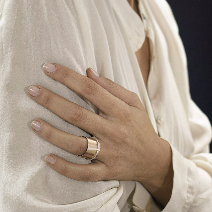 Second Skin 18K gold diamond ring on hand – Cynthia Raffoul