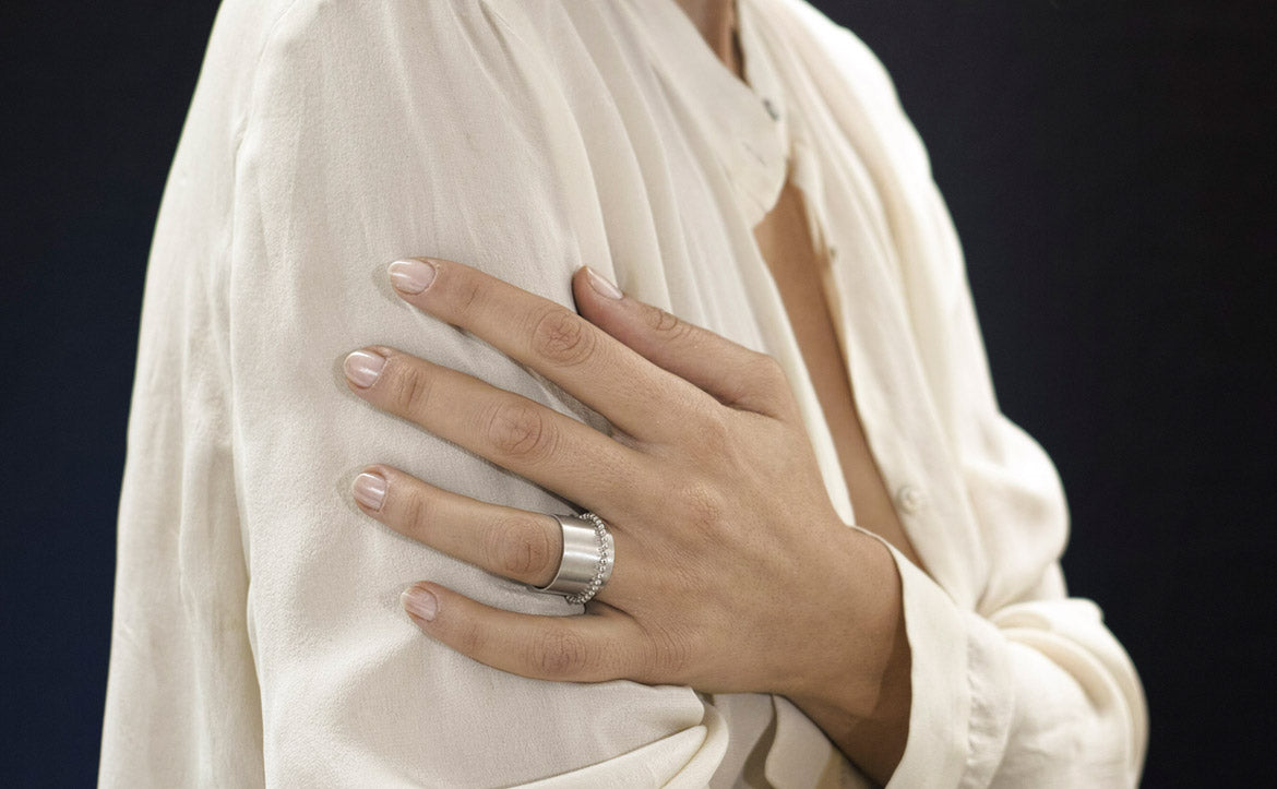 gold ring on woman hand