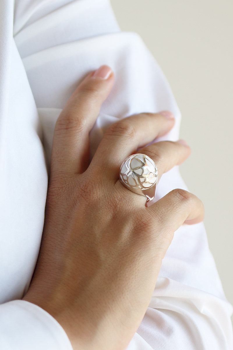 Caramel silver rings on woman hand size Large