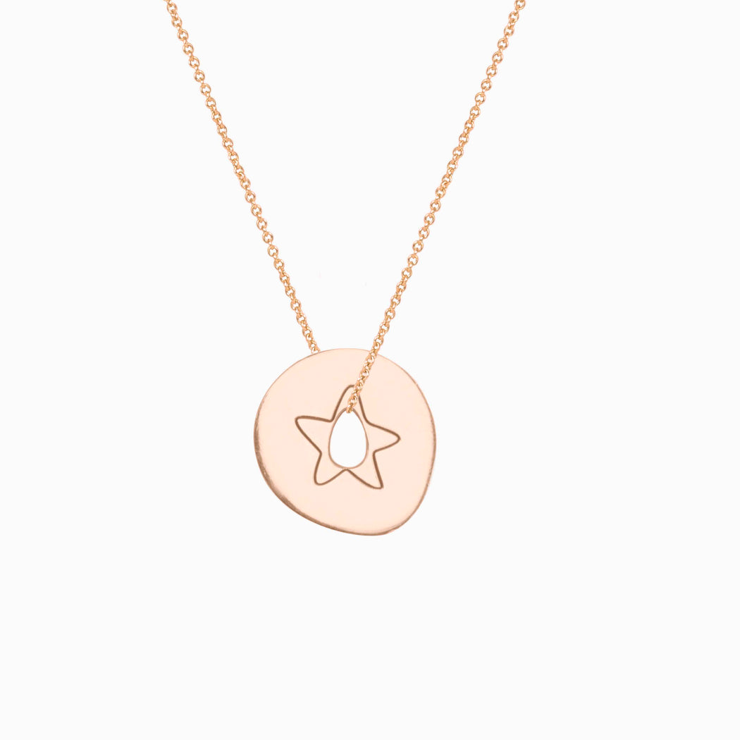 gold pendant with a star 