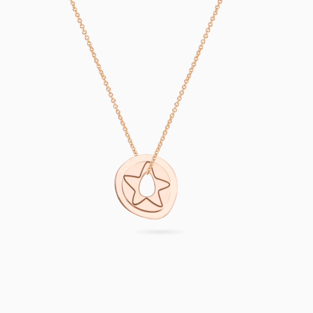 gold pendant with a star
